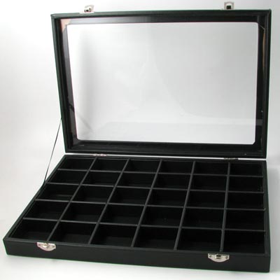 Display box with black leatherette, with lid and 30 compartments.