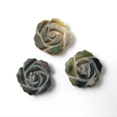 Mother-of-pearl flower, dark brown and shimmering rosa, with a hole in the centre, 11mm, 4pcs.
