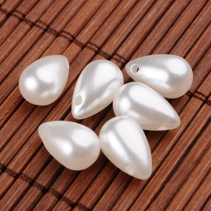 Plastic bead with pearl look, cross-drilled white drop, diameter 13x8 mm. 10 pcs.