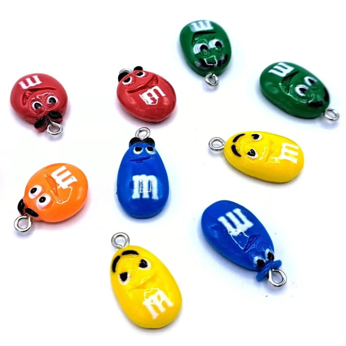 M&M candy imitation, various pendant with metal eye, plastic, mix colours, 19x14x6 mm, 6 pcs