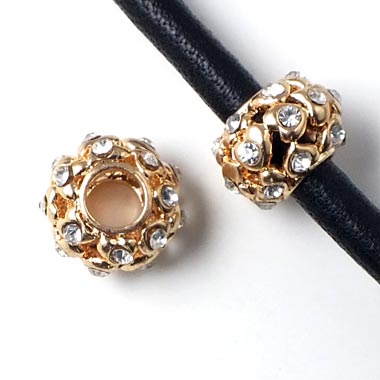 Gilded bead, perforeret w. several crystals, 13x9mm, with 4.8mm hole, 1pc.