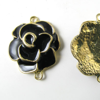 Enamelled rose, gilded and black, 2 eyes, 25x35mm, 1pc.