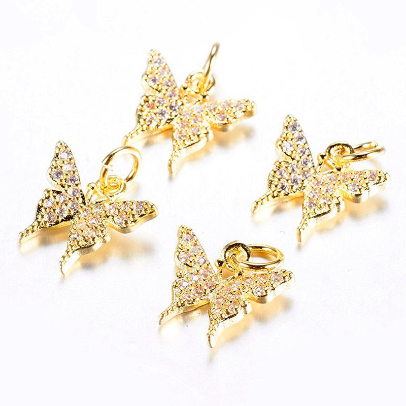 Butterfly with zirconia, gold-plated brass, pendant with eyelet, 11x12x2,5 mm, 2 pcs