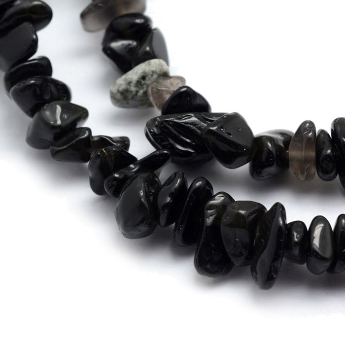 Glass beads, full strand, small nuggets, black, ca. 8x4x2 mm, ca. 230 pcs.