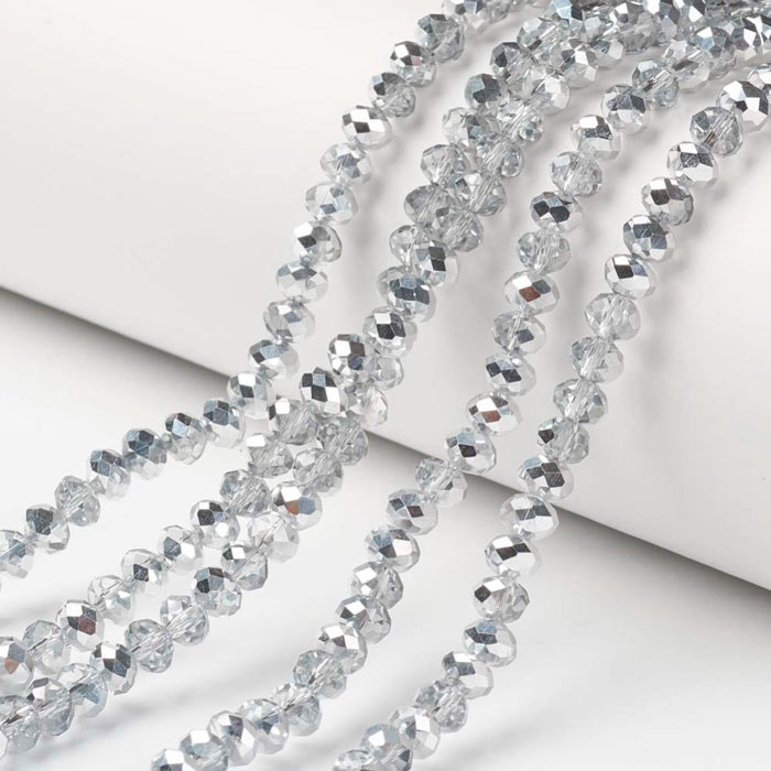 Celestial crystal, full strand, clear, half silver-plated, rondelle, 4x3 mm, approx. 130 pcs
