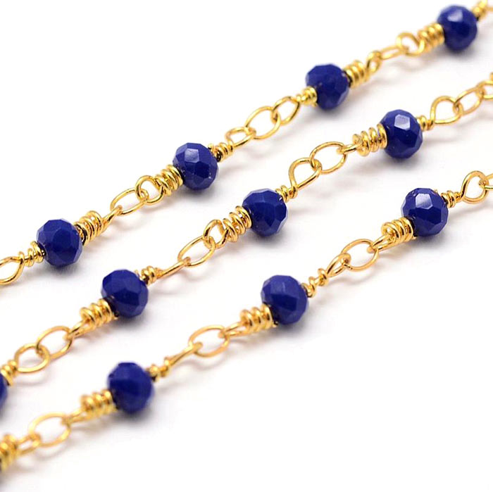 Chain of faceted glass beads, prussian blue, gold-plated brass, 4 mm, 50 cm