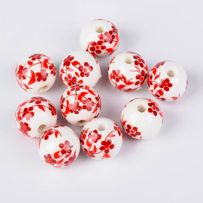 Porcelain bead, white with red flowers, round, 12 mm, 4 pieces