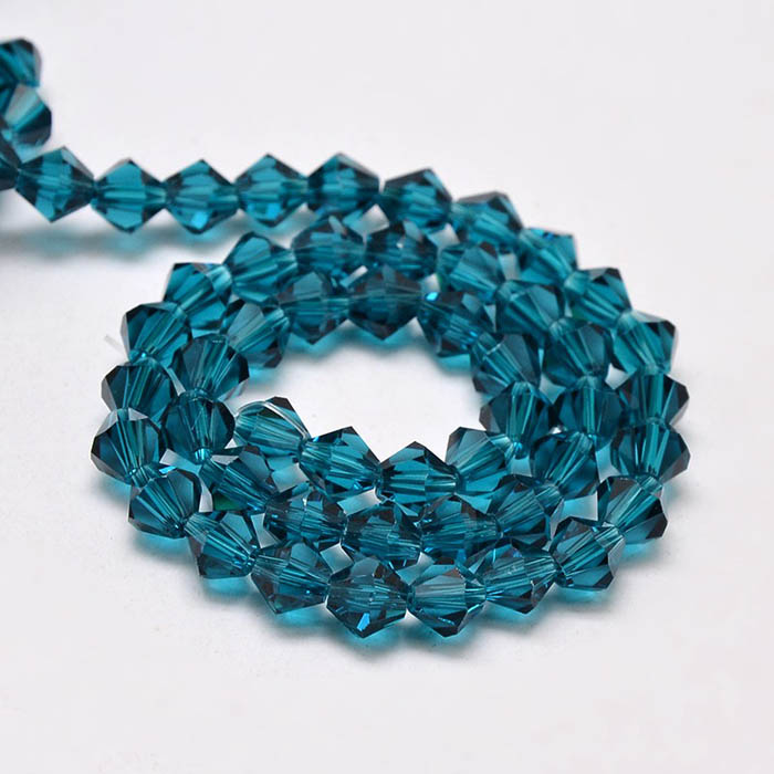 Celestial crystal, complete strand, bicone, faceted steelblue,  4x4 mm, 110pcs.