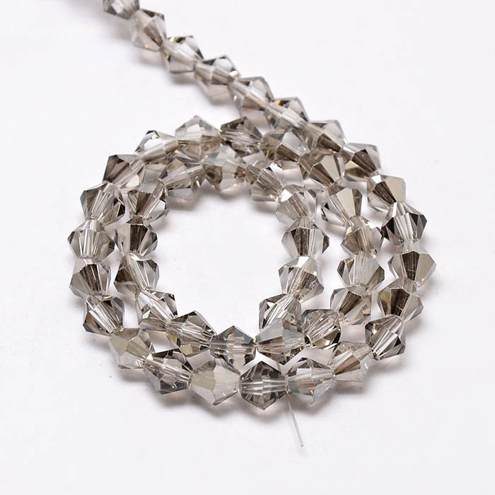 Celestial crystal, complete strand, bicone, faceted light grey,  4x4 mm, 110pcs.