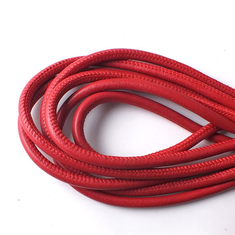 Stitched leather cord, round, red, 4mm, 20cm. If you purchase more than one unit, cord will be delivered uncut.