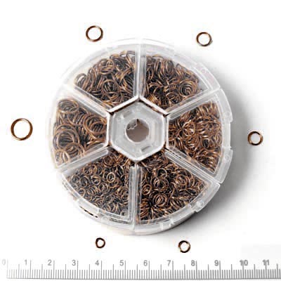 Jumpring-set, antique copper, in smart plastic container with 8 different sizes.