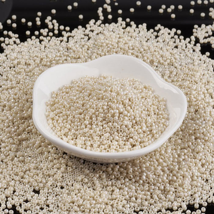 Toho Seed beads, light beige, opaque, AB luster, #11, 2x1.5mm, 10gr., 1100 pcs