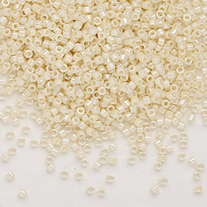 Delica, size #11, cream white glass bead, opaque, alternating, 1,1x1,7mm, 5,2 g