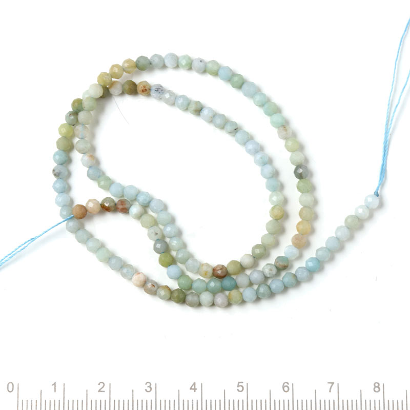 Stone mix, whole strand, mixed turquoise and brown colours, faceted, 3.5x3 mm, approx. 130 pcs