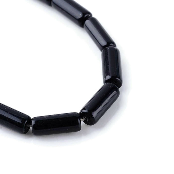 Obsidian tube bead, whole strand, 15x6 mm, approx. 27 pieces.
