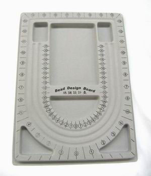 Bead tray in gray plastic with velvet surface, cm and inch indication. 23.5 x 32.5cm