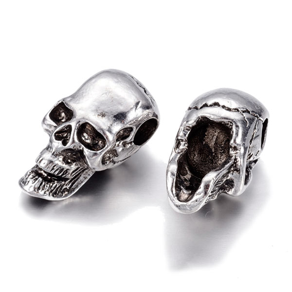 Skull bead with horizontal hole, antique silver colored brass, 24x12x13mm, 1pc