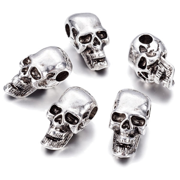 Skull bead with horizontal hole, antique silver colored brass, 24x12x13mm, 1pc