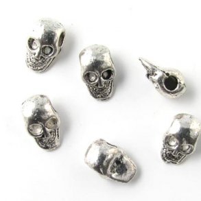 14 Stk., oxidierte Perlen, Totenköpfe, 7x11 mm