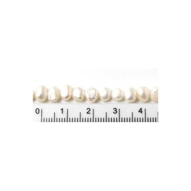 Swasserperle, barock, wei, A-grade. 5,5x6,5 mm, 10 Stk.