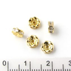 Zwischenperle mit klaren Kristallen, vergoldet, 6x3 mm, 6 Stk.