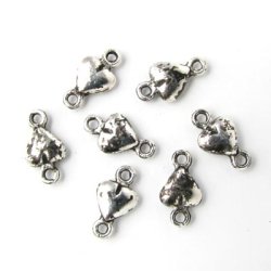 100 Stk., oxidiert, silberfarben, Herzen, mit zwei &Ouml;sen, 10x5 mm