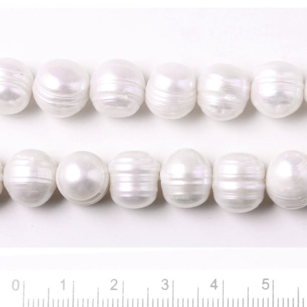 Freshwater pearl, white, uneven round, 10x11mm, B-grade, 4pcs