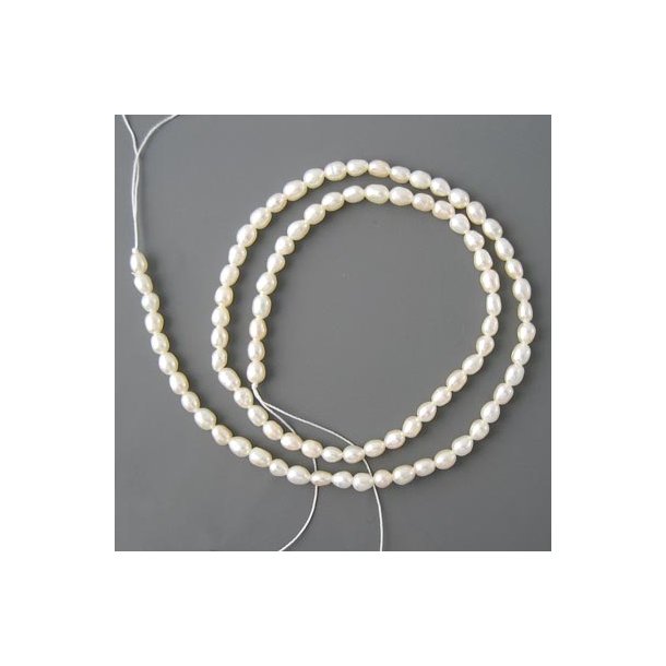 Freshwater pearl, full strand, small, white, rice shape, 3x2mm, A-grade, ca. 135 pcs