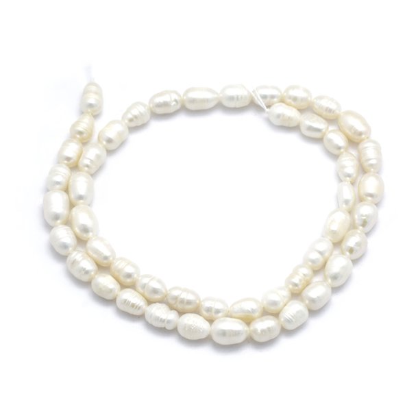 Freshwater pearl, full strand, white, 6-7x5-6mm, C-grade, ca. 54pcs.
