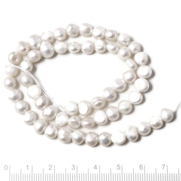 Freshwater pearl, full strand, baroque, white, 6x7,5mm, A-grade, approx 60pcs