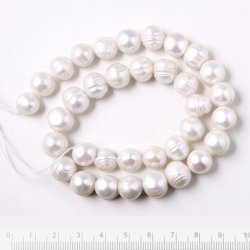 Freshwater pearl, full strand, white, uneven round, 10x11mm, C-grade, ca. 34pcs