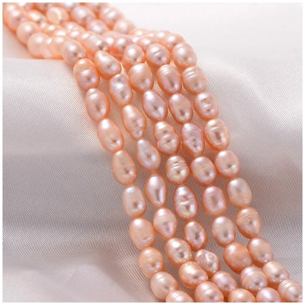 Freshwater pearl, full strand, peach, rice, ca. 3,5x2,5mm, A-grade, appx. 100pcs