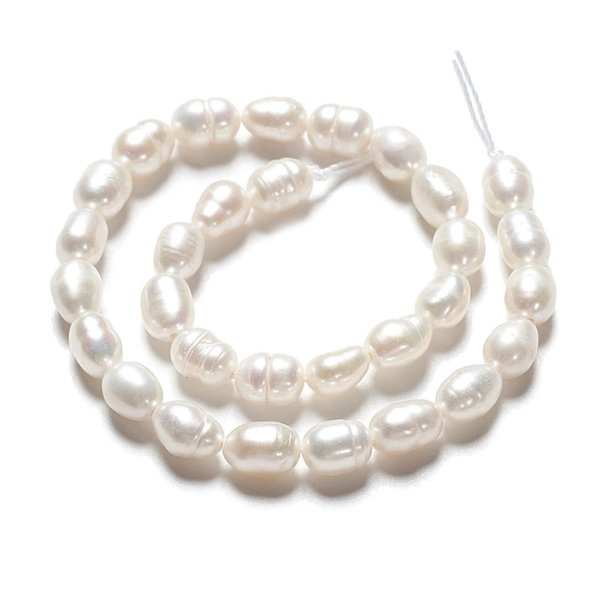 Freshwater pearl, half strand, white rice-shaped, appx. 6x4.5 mm, appx. 27 pieces