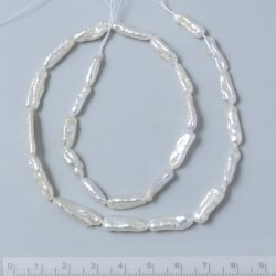 Swasserperle, lang, barock, wei, 16-18x6x5mm, A-grade, 2 Stk