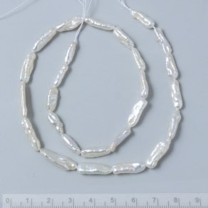 Swasserperle, ganzer Strang, lang, barock, wei, 16-18x6x5mm, A-grade, ca. 21 Stk