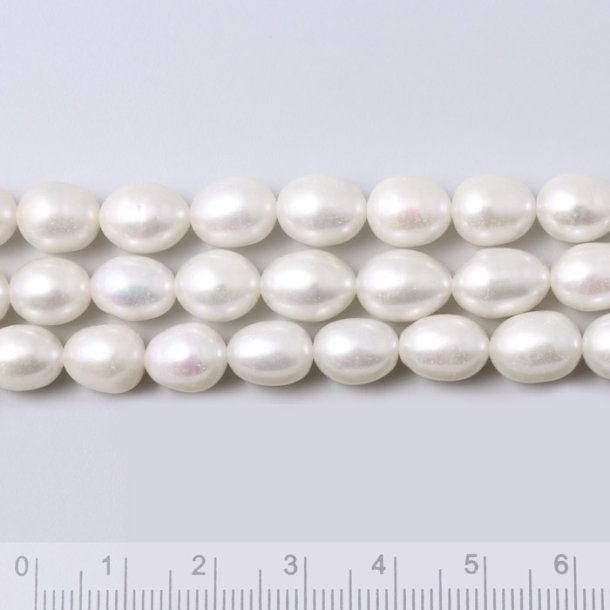 Freshwater pearl, white, oval, ca. 8x5.5mm, A-grade, 6pcs