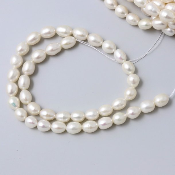 Freshwater pearl, full strand, white drop, ca. 7,5x5,5mm, A-grade, appx. 48pcs