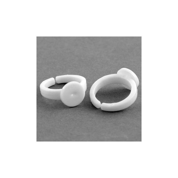 Finger ring in plastic with 9mm plate. Child size 44-46, 2pcs.