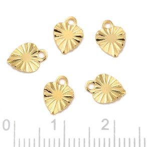 Pendant, small faceted heart, gold-plated steel, 8x6x0.7 mm, 6 pcs