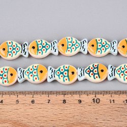 Glasperle, emaillierter Fisch, hellblau, orange, beige, 20x13x5,5 mm, 2 Stck