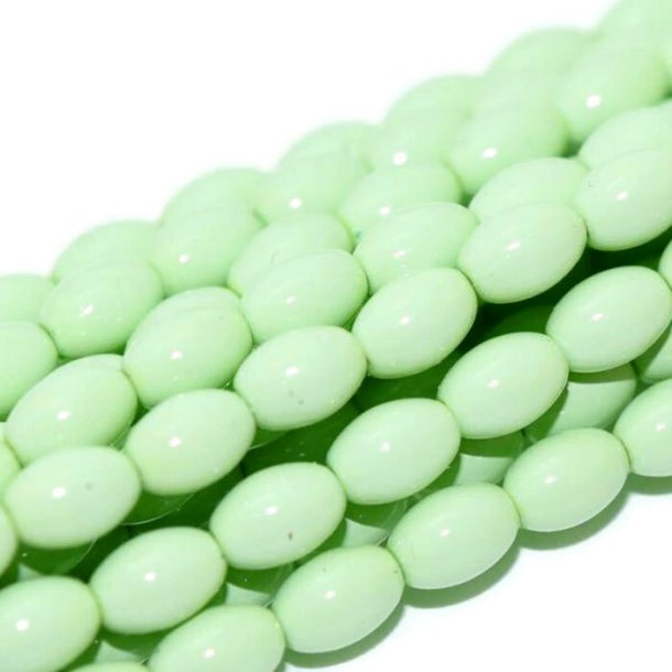 Glass beads, whole strand, rice-shaped, coated, pastel green, 6x4mm, approx. 100 pcs