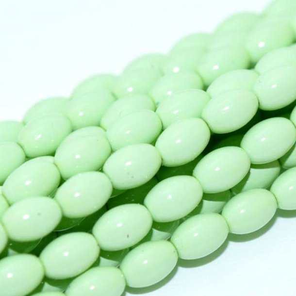 Glass beads, rice-shaped, coated, pastel green, 6x4 mm, 10 pcs