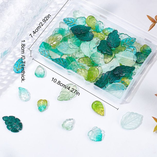 Glass pendants mix in plastic box, leaves in green shades, approx. 100 pcs