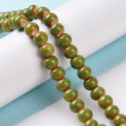 kleine Keramikperle, gelb-grn gesprenkelt, rund, ca. 6 mm, ca. 59 Stck