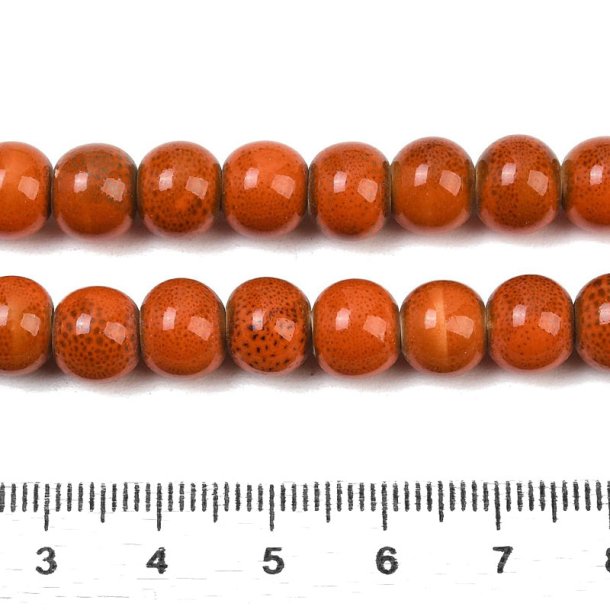 Ceramic bead, orange-red, speckled, round, 8 mm, 10 pcs