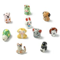 Tiere aus farbigem Porzellan: Hund, Katze, Affe, Pinguin, L�we u. a. 11 Stck