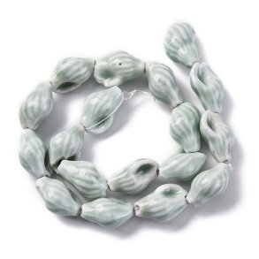 Meeresschneckenhaus, Keramikperle, helles grau-blau, 22x14 mm, 18 Stk