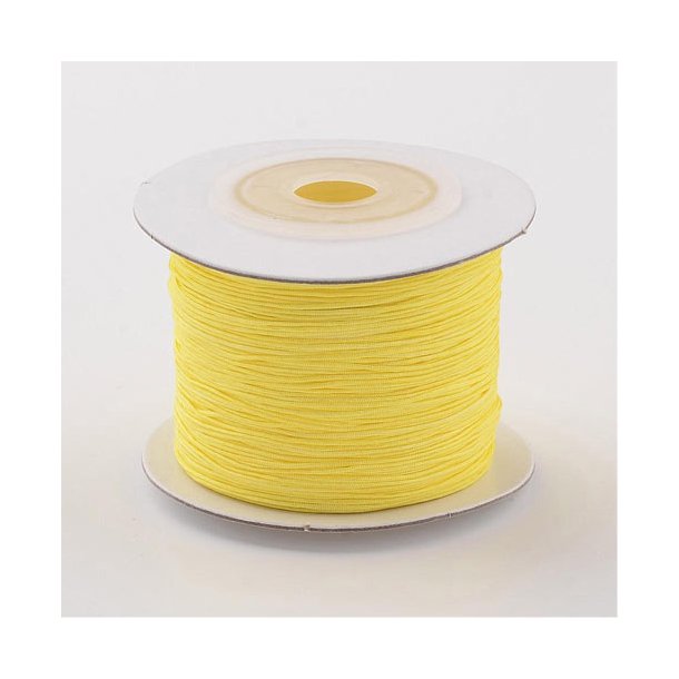 Nylon cord, yellow, thin, 0,5 mm, 70 m spool, 1 stk.