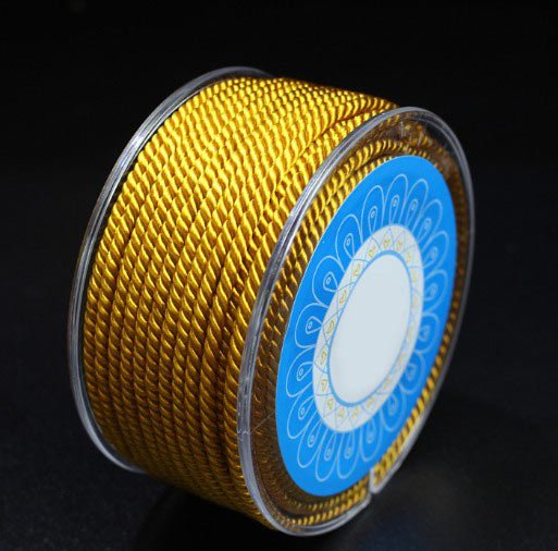 nylonsnor-snoet-dekorationssnor-hel-rulle-gylden-rund-1-5-mm-23-m