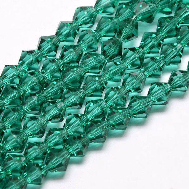 Celestial crystal, complete strand, bicone, faceted emerald-green,  4x4 mm, ca. 105pcs.